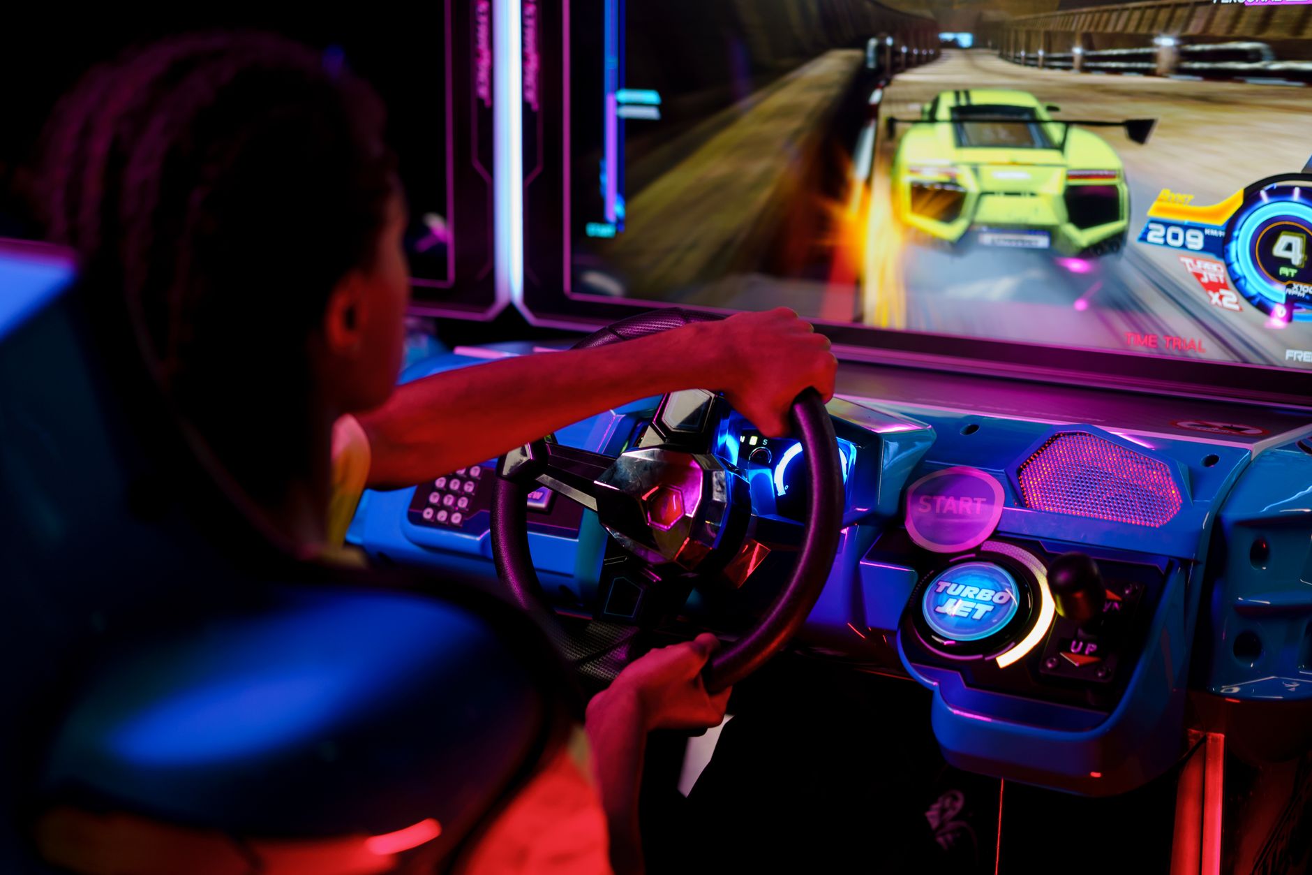 Neon racing game on screen